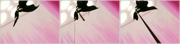 Tuxedo Kamen allunga il bastone per attaccare a distanza